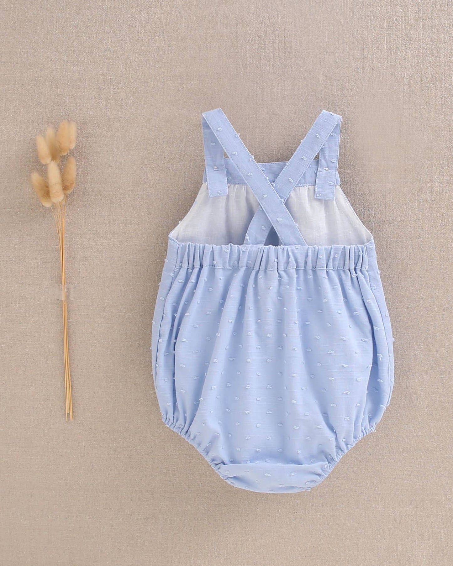 Dadati - Baby boy blue plumeti romper with crossed straps