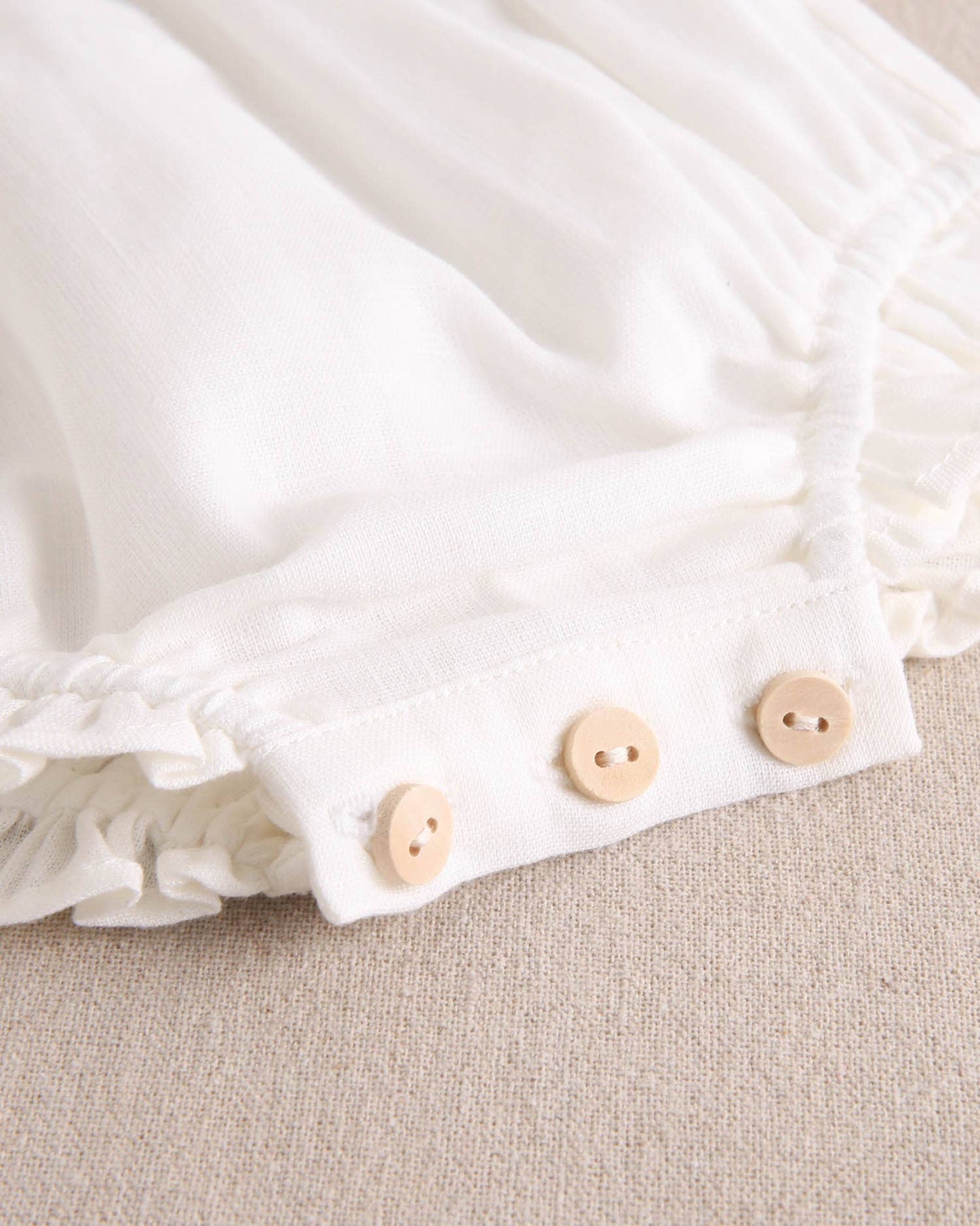 Dadati - White baby girl romper with blue side bows
