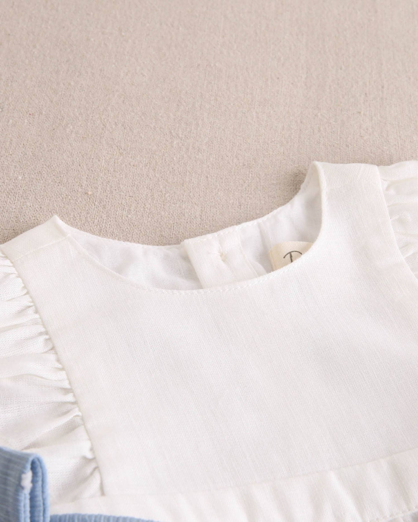 Dadati - White baby girl romper with blue side bows