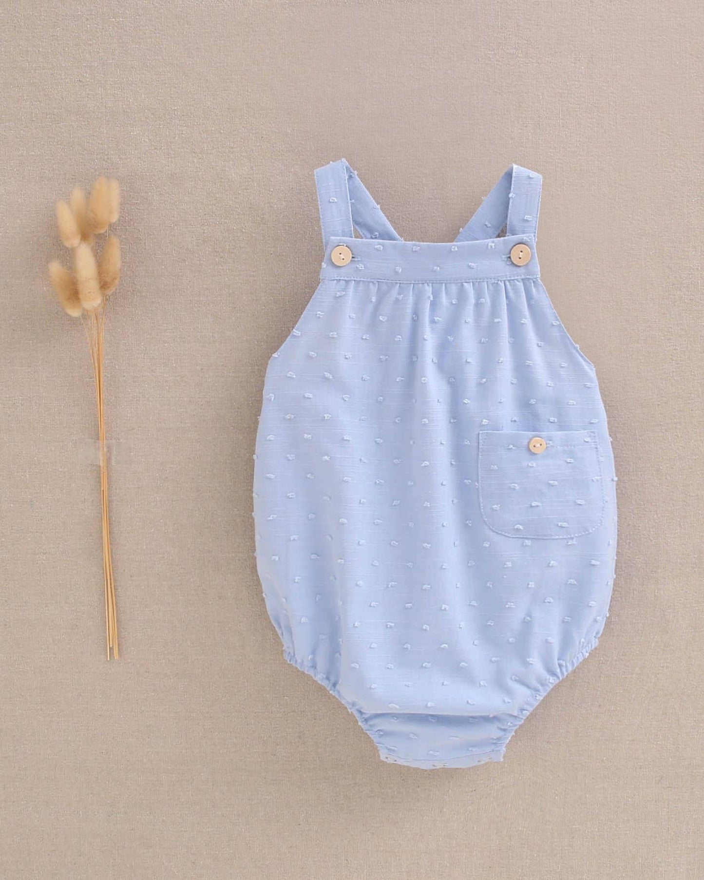 Dadati - Baby boy blue plumeti romper with crossed straps