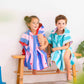 Quut Toys - Quut Ponchos for Swim & Beach, Compact, Quick Dry, Side snap