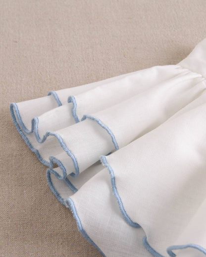 Dadati - White girl's dress with blue edges and a bow on the back