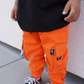 Little Trouble - Orange Cargos