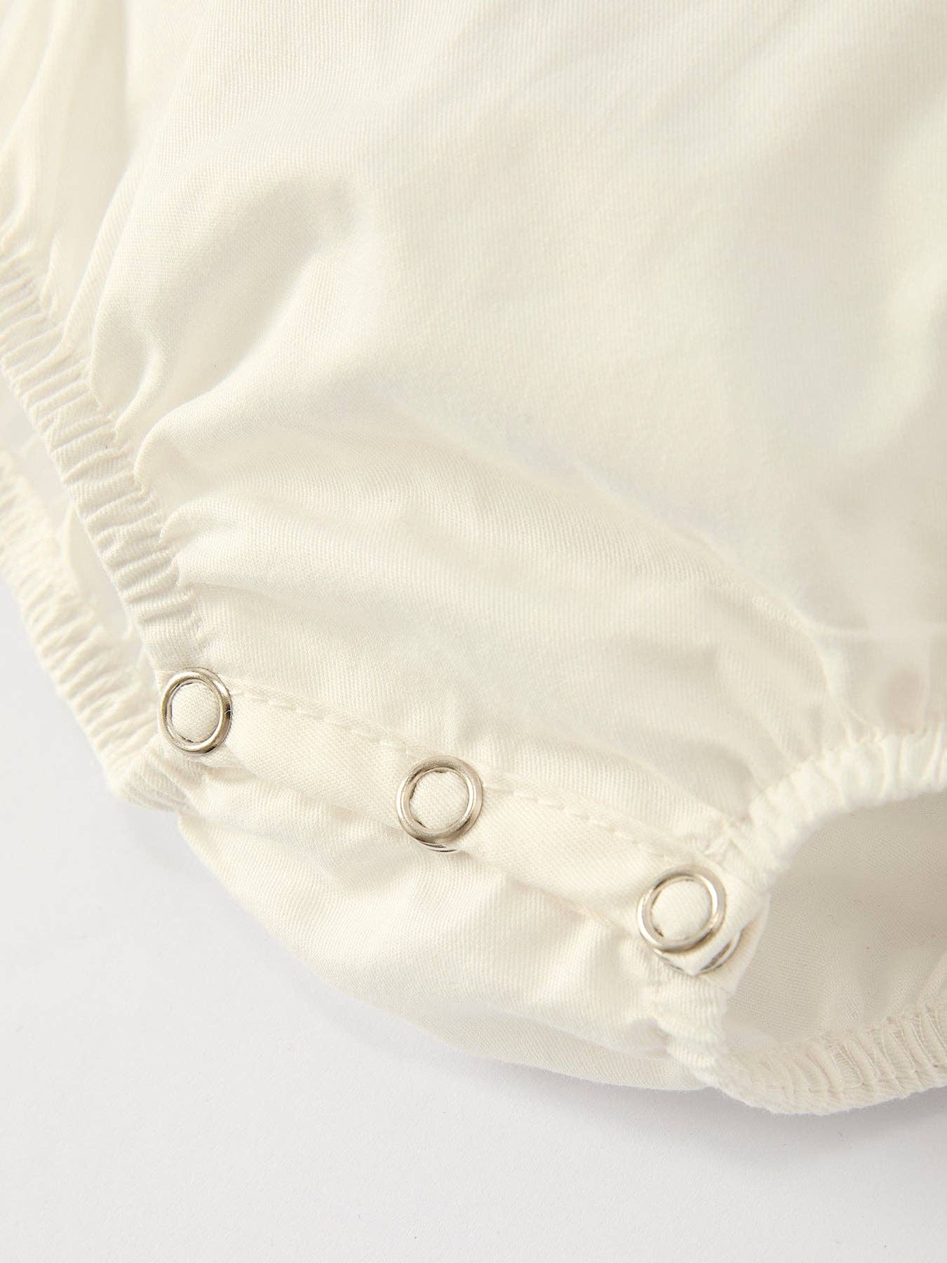 Rylee Faith Designs - Christmas Girl's Romper : Delicate Embroidery with Red Bow Details