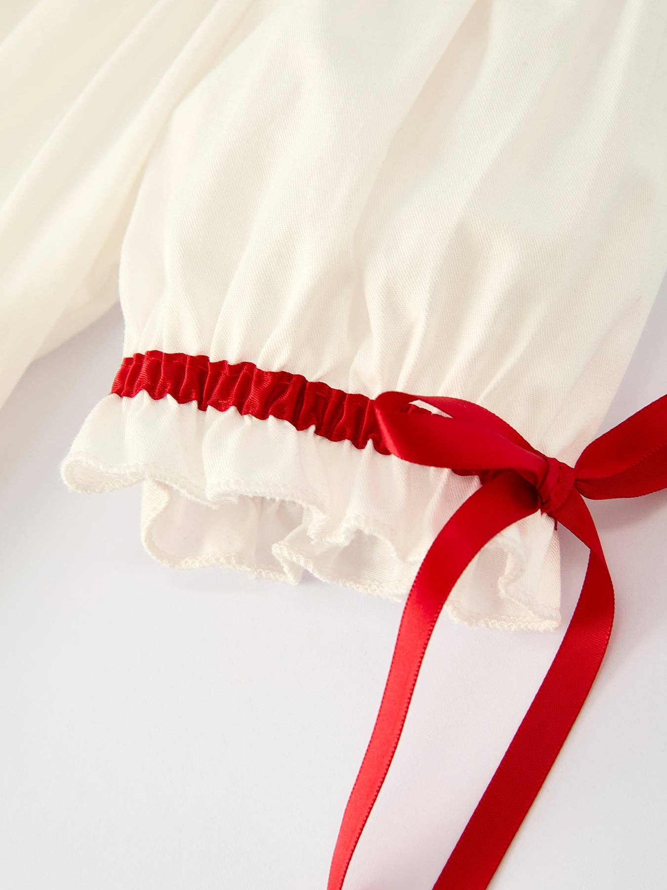 Rylee Faith Designs - White Christmas Girl's Dress: Delicate Embroidery with Red Bow Details