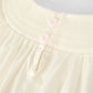 Rylee Faith Designs - White Christmas Girl's Dress: Delicate Embroidery with Red Bow Details